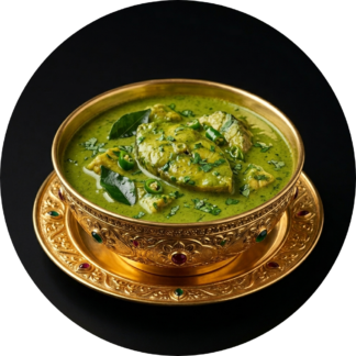 Green fish curry in golden bowl
